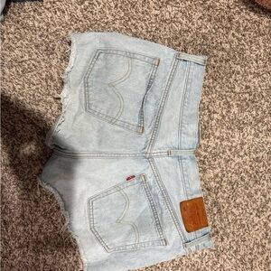 Levi's Blue Jean Shorts with Raw Hem and Faded Wash